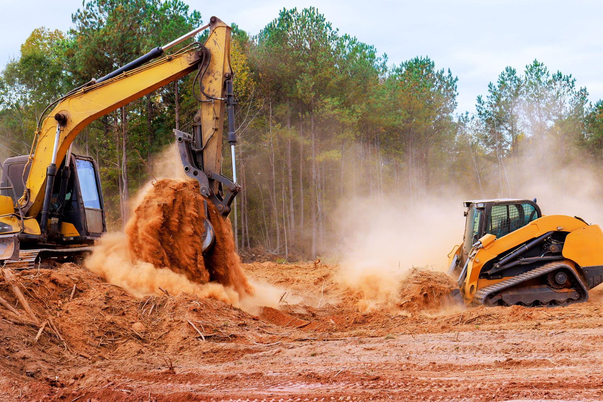 Bulldozer is leveling ground earthmoving on a construction site in preparation for grading soil